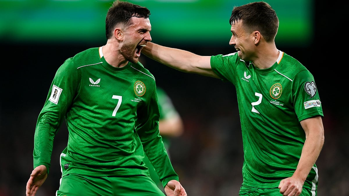 Troy Parrott celebrates his second goal with Seamus Coleman