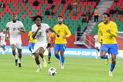 | Photo: AP : Nigerias Benjamin Fredrick, centre left, and Gabons Pierre-Emerick Aubameyang, right, challenge for the ball during the World Cup 2026 African qualifying semi-final soccer match between Nigeria and Gabon, in Rabat, Morocco.