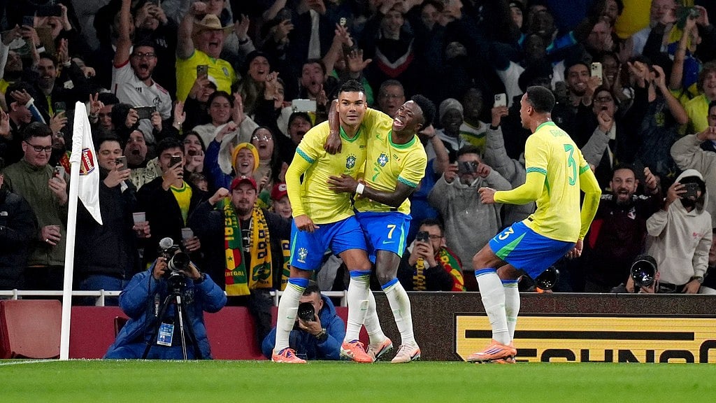 Photo: John Walton/PA via AP : Brazil Vs Senegal Highlights, International Friendly: Casemiro, left, celebrates scoring his side's second goal.