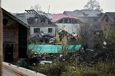 | Photo: Yasir Iqbal : Site of a police station that was destroyed by an accidental explosion in Nowgam, Srinagar, Kashmir.