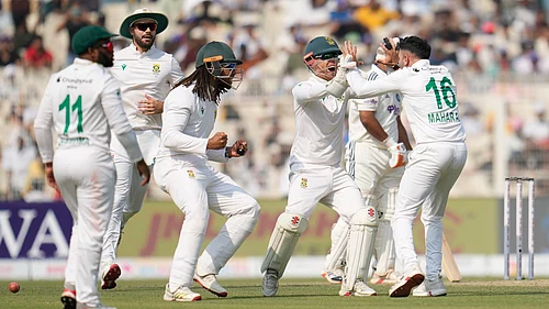 (AP Photo/Aijaz Rahi) : South Africas Keshav Maharaj, right, and teammates celebrate prematurely for the wicket of Indias Rishabh Pant on the third day of the first cricket test match between India and South Africa in Kolkata, India, Sunday, Nov. 16, 2025.