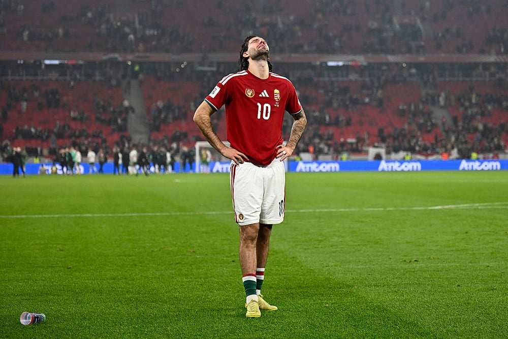 | Photo: AP/Denes Erdos : Hungary's Dominik Szoboszlai is dejected at the end of the World Cup 2026 group F qualifying soccer match between Hungary and Ireland in Budapest, Hungary.