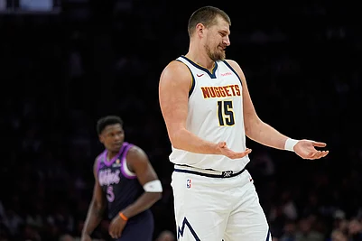 | Photo: AP/Abbie Parr : Denver Nuggets center Nikola Jokic (15) reacts after a foul called on him during the first half of an NBA basketball game against the Minnesota Timberwolves in Minneapolis.