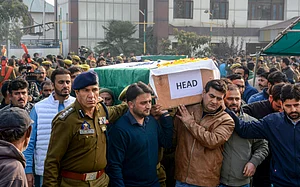 -PTI : Srinagar: Police and security personnel and family members of the nine persons killed in the accidental blast at Nowgam police station carry the mortal remains during a wreath laying ceremony at the Police Control Room, in Srinagar, Saturday, Nov. 15, 2025.