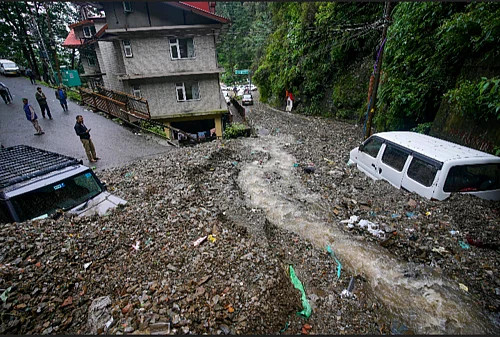 PTI : Vehicles stuck in the debris following heavy rainfall, in Shimla, Thursday, Aug. 14, 2025