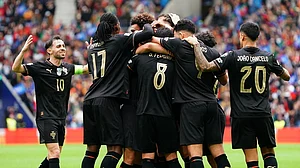 File Photo : Portugal celebrate during their 9-1 win over Armenia