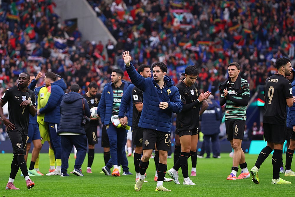 | Photo: AP/Luis Vieira : Portugal's Vitinha waves at the end of a World Cup 2026 group F qualifying soccer match between Portugal and Armenia in Porto, Portugal.