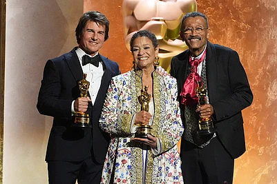 | Photo: AP/Chris Pizzello : Tom Cruise, from left, Debbie Allen, and Wynn Thomas, winners of Academy honorary awards pose onstage during the 16th Governors Awards at The Ray Dolby Ballroom in Los Angeles.
