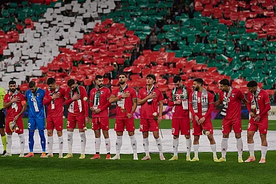 | Photo: AP/Miguel Oses : Palestinian players line up ahead of a friendly match against Spanish players from the Basque Country, held to protest Israels military actions in Gaza, in Bilbao, Spain.