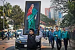 | Photo: AP : In ol’ Times: A supporter of Sheikh Hasina carries her giant portrait in Dhaka on December 27, 2018