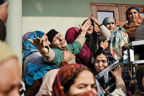 | Photo: Yasir Iqbal : In Mourning: Grieving family members of Nowgam blast victims