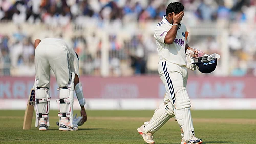 | Photo: AP/Aijaz Rahi : Indias Rishabh Pant reacts as he walks off the field after losing his wicket on the third day of the first cricket test match against South Africa in Kolkata on Sunday, November 16, 2025.