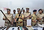 PTI : ADGP (Intelligence) Mahesh Chandra Laddha with other officials shows recovered arms and ammunitions during a press conference, in Vijayawada