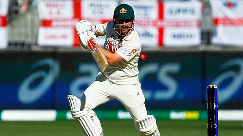 (AP Photo/Gary Day) : Australias Travis Head bats during the first Ashes cricket test match between Australia and England in Perth, Friday, Nov. 21, 2025.