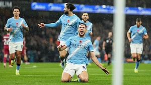 | Photo: AP/Jon Super : Manchester City's Nico Gonzalez celebrates after scoring his side's second goal during the English Premier League match against Liverpool on November 9, 2025.