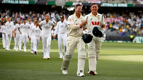 (AP Photo/Gary Day) : Australias captain Steve Smith, left, and Marnus Labuschagne leave the field after winning their first Ashes cricket test match against England in Perth, Saturday, Nov. 22, 2025