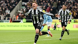 Harvey Barnes celebrates after scoring Newcastle United's second goal against Manchester City