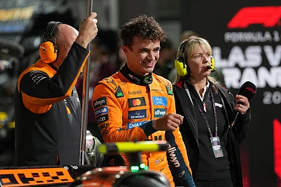 | Photo: AP/Eric Gay : McLaren driver Lando Norris of Great Britain celebrates after a qualifying session at the Formula One Las Vegas Grand Prix auto race in Las Vegas.