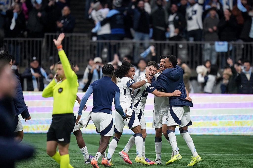 | Photo: Darryl Dyck/The Canadian Press via AP : Vancouver Whitecaps' Jayden Nelson, back left to right, Sebastian Berhalter, Mathias Laborda and Ali Ahmed celebrate after Vancouver defeated Los Angeles FC during penalty kicks in the MLS Western Conference semifinal playoff soccer match,  in Vancouver, British Columbia.