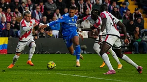 | Photo: AP/Manu Fernandez : Rayo Vallecano's Pep Chavarria and teammates stop Real Madrid's Kylian Mbappe from scoring during a Spanish La Liga match on November 9, 2025.