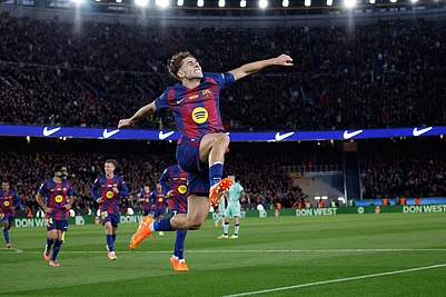 | Photo: AP/Joan Monfort : Barcelonas Fermin Lopez celebrates after scoring during a La Liga soccer match between Barcelona and Athletic in Barcelona, Spain.