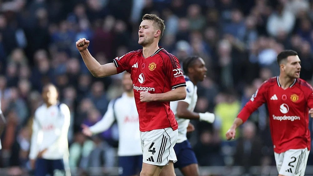 | Photo: AP/Ian Walton : Manchester United's Matthijs de Ligt celebrates after scoring his side's second goal during the English Premier League soccer match between Tottenham Hotspur and Manchester United in London, England.