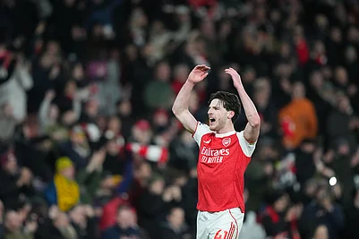 | Photo: AP/Frank Augstein : Arsenals Declan Rice celebrates after a Premier League soccer match between Arsenal and Tottenham in London.