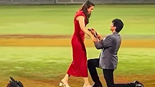 | Photo: @palash_muchhal/Instagram via PTI : World Cup-winning Indian womens cricket team star Smriti Mandhana being proposed by music composer Palash Mucchal for marriage at the DY Patil Stadium, in Navi Mumbai.