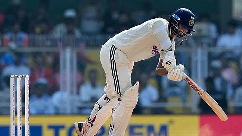 Photo: AP/Anupam Nath : Indias Washington Sundar plays a shot on the third day of the second cricket test match between India and South Africa in Guwahati.