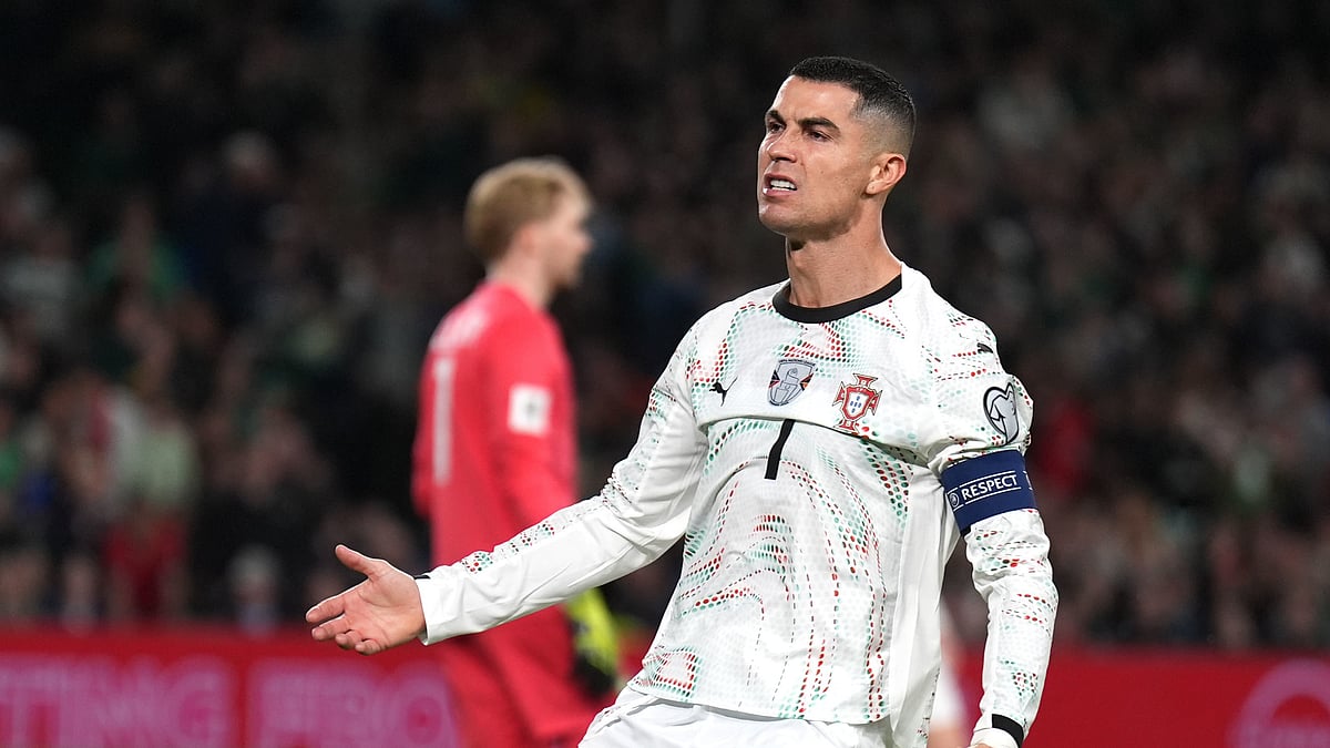(Niall Carson/PA via AP) : Portugal's Cristiano Ronaldo reacts during a World Cup 2026 group F qualifying soccer match between Ireland and Portugal in Dublin, Thursday, Nov. 13, 2025.