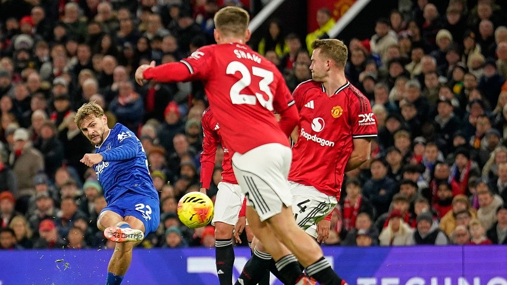 Photo: AP : Manchester United Vs Everton Highlights, English Premier League: Kiernan Dewsbury-Hall, left, scores the opening goal at Old Trafford.