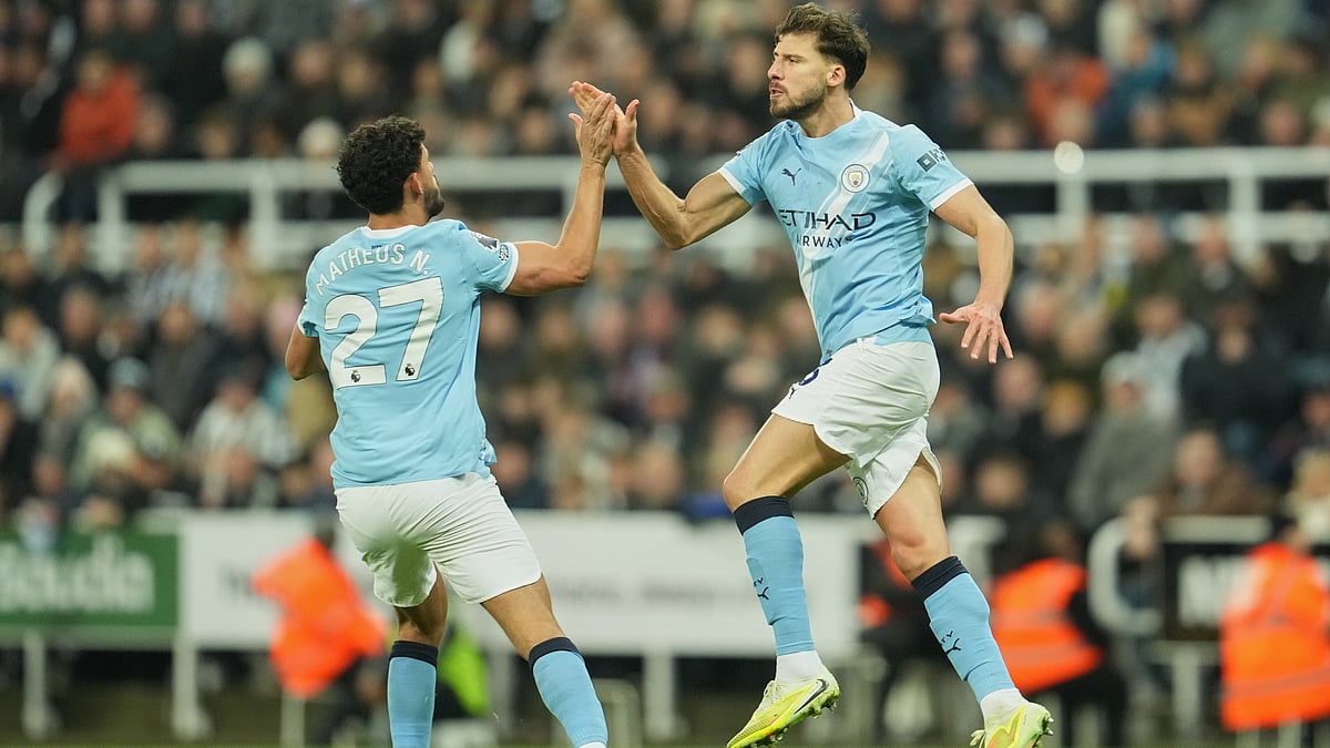| Photo: AP/Jon Super : Manchester City's Matheus Nunes and Ruben Dias celebrate after scoring during the English Premier League match against Newcastle United on November 22, 2025.