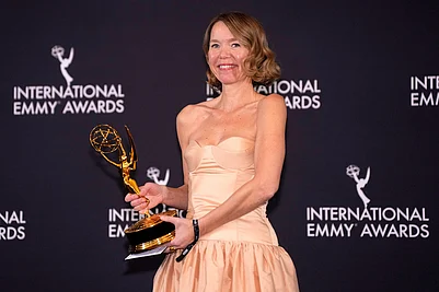 | Photo: Charles Sykes/Invision/AP : Anna Maxwell Martin, winner for Best Performance by an Actress for Until I Kill You, appears in the press room during the 53rd International Emmy Awards at the New York Hilton Midtown in New York.