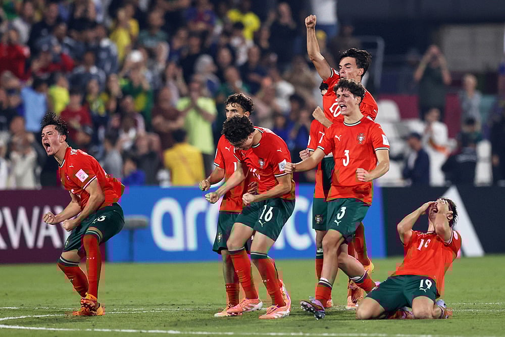 | Photo: AP/Hussein Sayed : Portugal players celebrate their victory after beating Brazil in a penalty shootout during the FIFA U17 World Cup semifinal soccer match in Doha, Qatar.