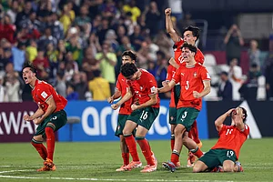 | Photo: AP/Hussein Sayed : Portugal players celebrate their victory after beating Brazil in a penalty shootout during the FIFA U17 World Cup semifinal soccer match in Doha, Qatar.