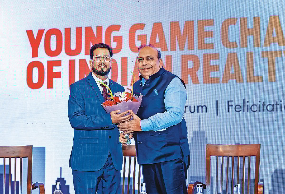 Anand Kumar, Chairman, Delhi RERA, being welcomed by Kausar Firdausi.