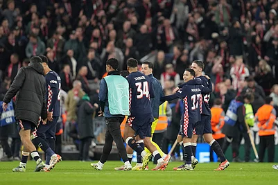 | Photo: AP/Jon Super : PSVs team players celebrate after the Champions League opening phase soccer match between Liverpool and PSV in Liverpool, England.