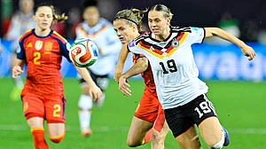 | Photo: dpa/Uwe Anspach via AP : Germany's Klara Buhl and Spain's Irene Paredes fight for the ball during the UEFA Women's Nations League match on November 28, 2025.