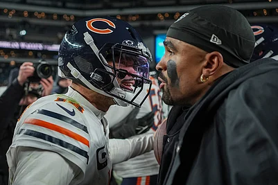 | Photo: AP/Matt Slocum : Chicago Bears quarterback Caleb Williams (18), left, hugs Philadelphia Eagles quarterback Jalen Hurts (1) after the Bears win in an NFL football game in Philadelphia.