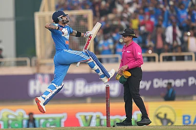 | Photo: AP/Rafiq Maqbool : Indias Virat Kohli celebrates his century during the first One Day International match between India and South Africa in Ranchi.