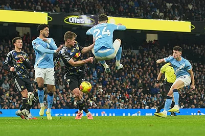 | Photo: AP/Ian Hodgson : Manchester Citys Phil Foden, right, scores during the English Premier League soccer match between Manchester City and Leeds United in Manchester, England.