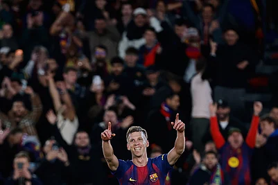 | Photo: AP/Joan Monfort : Barcelonas Dani Olmo celebrates after scoring his sides third goal during a Spanish La Liga soccer match between Barcelona and Alaves, in Barcelona, Spain.