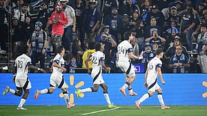 (AP Photo/Denis Poroy) : Vancouver Whitecaps players celebrate after Brian White (24) scored during the first half of an MLS Western Conference final soccer match against San Diego FC, Saturday, Nov. 29, 2025, in San Diego.
