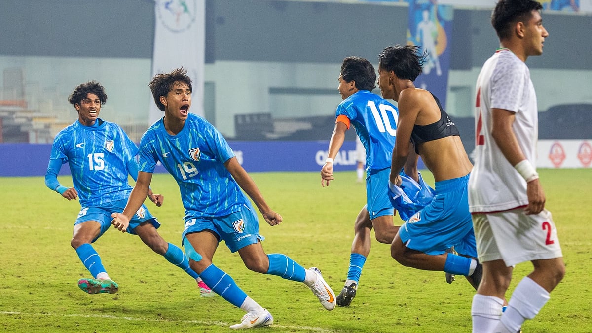 | Photo: X/IndianFootball : India U17's Gunleiba Wangkheirakpam celebrates after scoring his side's second goal during the AFC U17 Asian Cup qualifying match against Iran on November 30, 2025.
