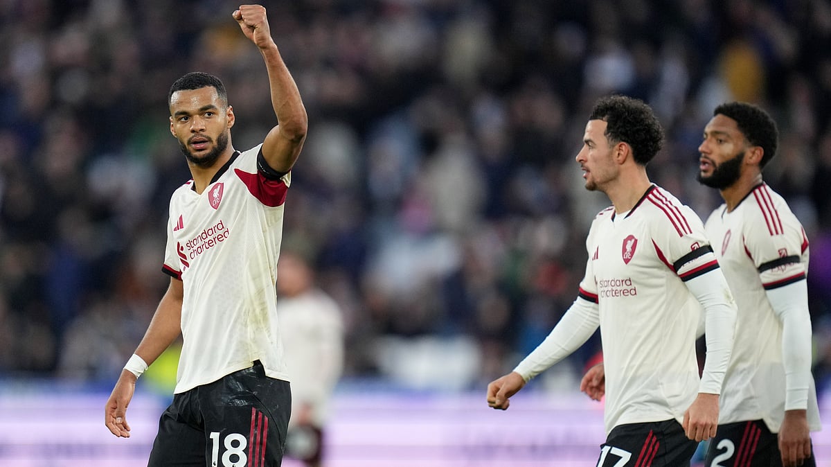 (AP Photo/Kirsty Wigglesworth) : Liverpool's Cody Gakpo celebrates after scoring his side's second goal during the English Premier League soccer match between West Ham United and Liverpool, in London, Sunday, Nov. 30, 2025
