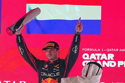 | Photo: AP/Altaf Qadri : Red Bull driver Max Verstappen of the Netherlands celebrates after winning the Qatar Formula One Grand Prix, in Lusail, Qatar.