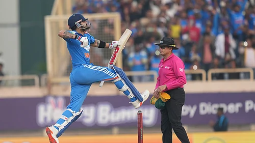(AP Photo/Rafiq Maqbool) : Indias Virat Kohli celebrates his century during the first One Day International match between India and South Africa in Ranchi, India, Sunday, Nov. 30, 2025.