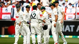 | Photo: AP/Gary Day : Australia's players celebrate the wicket of England's Jofra Archer on day two of the first Ashes cricket test match between Australia and England in Perth.