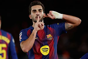 | Photo: AP/Joan Monfort : Barcelona's Ferran Torres celebrates his side's third goal during a Spanish La Liga soccer match between Barcelona and Atletico de Madrid, in Barcelona, Spain.
