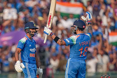 | Photo: PTI/Kunal Patil : Indias Ruturaj Gaikwad, left, celebrates his century with Virat Kohli during the second ODI cricket match of a series between India and South Africa, at Shaheed Veer Narayan Singh International Stadium, in Raipur, Chhattisgarh.